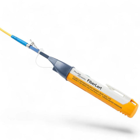 Fluke Networks FiberLert-125 fiber optic tester, angled view with orange handle and blue-gray body, yellow fiber lead.