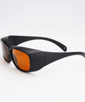 Professional Grade Kickass Laser Safety Glasses With Hella Od5 Plus Eye Defense Across One Hundred Ninety To Eleven Hundred Nanometer Wavelength Range For Spa Studios And Beauty Clinics In Classic Orange Lens, side view.