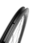 Close-up of Dope Carbon Disc Brake Road Wheelset 700C Clincher Tubeless Ready U Shape Rim Deep Sections, showcasing the rim design.