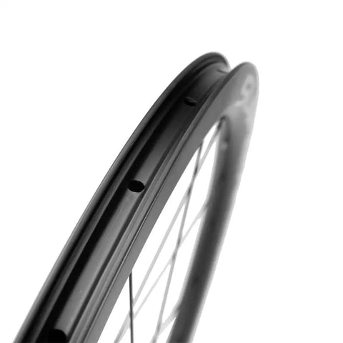 Close-up of Dope Carbon Disc Brake Road Wheelset 700C Clincher Tubeless Ready U Shape Rim Deep Sections, showcasing the rim design.