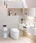 Bathroom with Free Standing Chrome Toilet Paper Holder With Reserve Shelf And Storage Basket next to modern sink