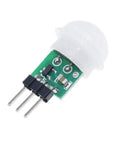 Dope Mini Pyroelectric PIR Motion Sensor Module For DIY Electronics Infrared Body Heat Detector Compact IR Sensor With Repeatable Trigger 4 Pack For Projects And Pro Home Automation. Green PCB PIR sensor with white dome lens and 3-pin header.