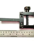 Spring Loaded Clamp Type Knurling Tool With Two Inch Capacity And Three Eighths Inch Shank For Lathes with a ruler for scale.