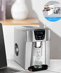 Countertop Ice Maker With 26 Lb Daily Output And 2 Liter Water Dispenser Churning Out Fresh Ice Straight Up In Glossy Silver with glass.