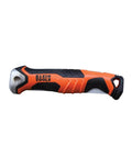 Side view of Klein Tools 31737 folding jab saw with orange and black plastic handle and visible metal blade