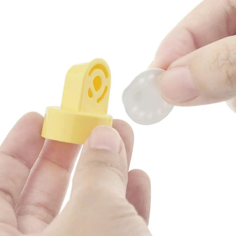 Replacement O Ring Kit With Two Membranes For Harmony Manual Breast Pump BPA Free FDA Registered Medical Device Easy Replacement To Restore Suction And Pump Performance, yellow O-ring and membrane in hand