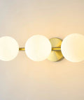 Three Light Vanity Light Fixtures In Gold Brass Finish With Dimmable Wall Sconce For Bath Mirror Milk Glass Shades With G9 Base Mid Century Modern Style Sleek Retro Vibe.