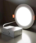 DAYBETTER 6 Inch 5 CCT Led Recessed Ceiling Light with Junction Box, illuminated round light with junction box attached.