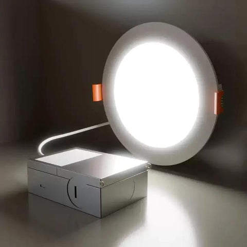 DAYBETTER 6 Inch 5 CCT Led Recessed Ceiling Light with Junction Box, illuminated round light with junction box attached.