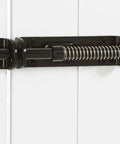 Heavy Duty Spring Loaded Sliding Door Bolt Lock Built Like An Absolute Tank Steel Gate Latch in black on a white door.