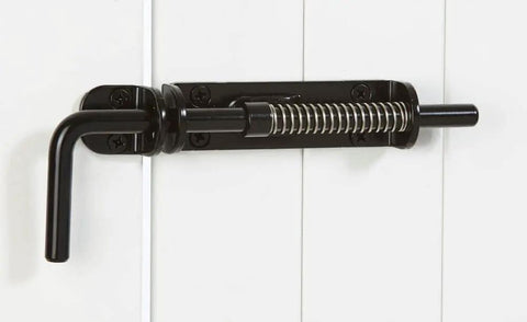 Heavy Duty Spring Loaded Sliding Door Bolt Lock Built Like An Absolute Tank Steel Gate Latch in black on a white door.