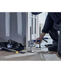 IRWIN Quick-Lift construction jack being used to lift a door/window frame during installation