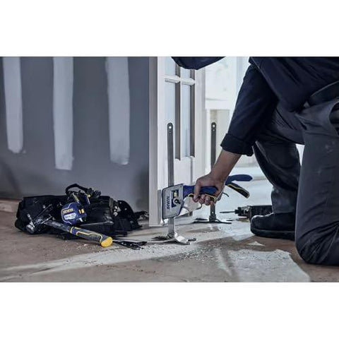IRWIN Quick-Lift construction jack being used to lift a door/window frame during installation