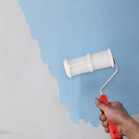 Person using Pro Grade Texture Paint Roller Delivers Killer Brick and Rustic Stone Looks on Interior Walls with blue paint.
