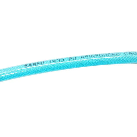 Close-up of reinforced polyurethane air hose one quarter inch ID (6.3x9.8mm) 100 feet, transparent blue, lettering visible on surface.