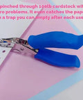 Blue One Circle Hole Punch With Soft Grip Handheld Paper Punch For Crafts Tags Card Making DIY Projects Scrapbooking And Greeting Cards Handy Small Puncher For Cardstock Laminated Cards shown on cardstock paper