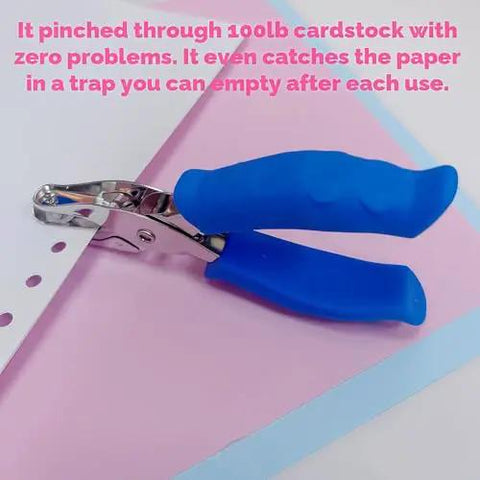Blue One Circle Hole Punch With Soft Grip Handheld Paper Punch For Crafts Tags Card Making DIY Projects Scrapbooking And Greeting Cards Handy Small Puncher For Cardstock Laminated Cards shown on cardstock paper
