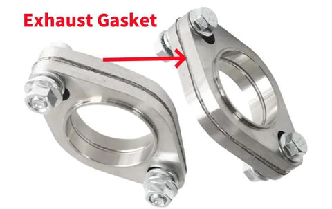 Angled view of two metal 3-inch exhaust gaskets with bolt-on flanges and nuts.