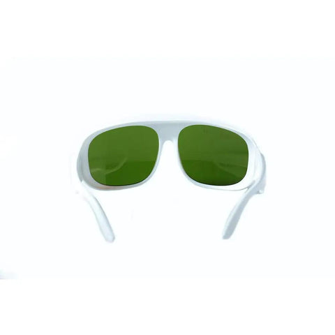Top-Shelf Laser Protective Glasses Delivering Killer 200-1400nm Beam Blocking Coverage With 10% Light Transmission for Crystal Clear Vision During IPL Work and Heavy-Duty Photonic Optics Eyewear You Can Rely On, featuring green lenses and white frames.