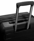 Carry-on luggage, black hardside 22-inch with extended telescoping handle (front view).
