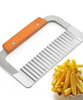 Crinkle-cut fry slicer with wooden handle and stainless steel blade, angled view.
