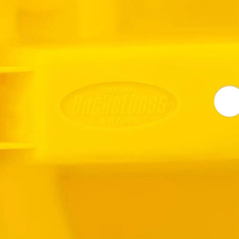Close-up of yellow plastic Stacker Small Parts Organizer For 5 Gallon Buckets With Four Compartments Nests Four Deep In Most Buckets