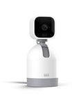 Smooth Swiveling Indoor Security Camera Locks Down Your Space With Crisp HD Video And Infrared Night Vision For Seamless Pan Tilt Coverage Plus Quick Plug And Play Two Way Audio Alexa Ready White on a desk.