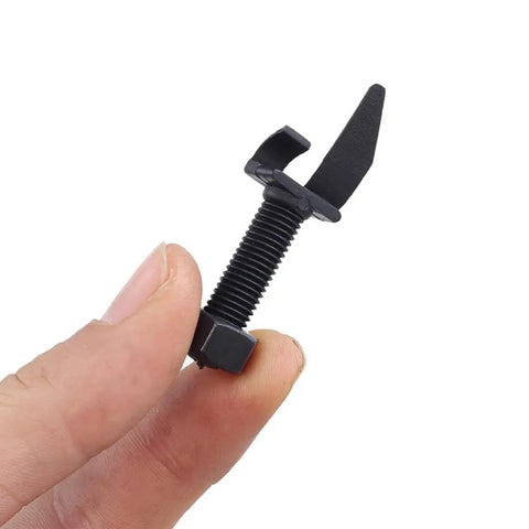 Close-up of Arrow Rest Replacement for Recurve and Take Down Bows, Screw On Bow Rest, PE Material, Black, held by fingers.