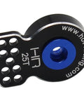 Close-up of Hot Racing aluminum servo saver, black with blue center screw, 25T SHS88H25