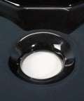 Close-up of USZWBY Vessel Sinks Bathroom Vessel Sink with Faucet Hole, glossy black ceramic surface and round drain opening.