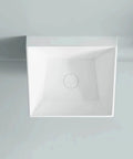 Upgrade Your Washroom Fast With This Heavy Duty Wall Mount Basin Sink Made From Solid White Ceramic And A Sleek Marble Glaze That Wipes Clean In Seconds And Saves You Major Trouble Every Time - top view of a square white ceramic basin sink.
