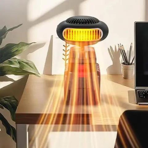 Rock Solid 170W Portable Space Heater With Smart Thermostat delivering heat on a wooden desk with plants and a laptop.
