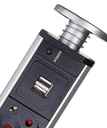 Slick Retractable Table Socket With Dual USB Ports And Six Standard Outlets Smooth Glide Design For Office Desks And Kitchen Countertops showing top view of power button and USB port.