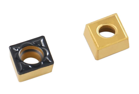 Close-up of CCMT 21.51 MD Carbide Insert With CVD Coating For Steel Machining, ISO CCMT060204, showing through hole and finish cut.
