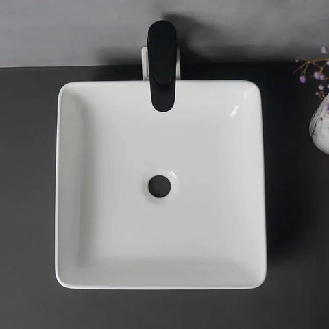 Top view of USZWBY Vessel Sinks Bathroom Vessel Sink Modern Simple Home Art Counter Basin Square Ceramic with faucet.