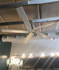 Heavy Duty 12ft HVLS Ceiling Fan With Brushless Motor And Built In VFD For Industrial And Commercial Use, mounted on ceiling.