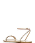 Kensy Flat Sandal For Women In Champagne With Ornate Embellishment And Breathable Leather Lining, side view showcasing strap details.