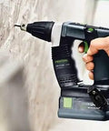 Hardcore No Fuss Cordless Construction Screwdriver With Brushless Motor Tech shown in use, driving screws into a wall, compact design.