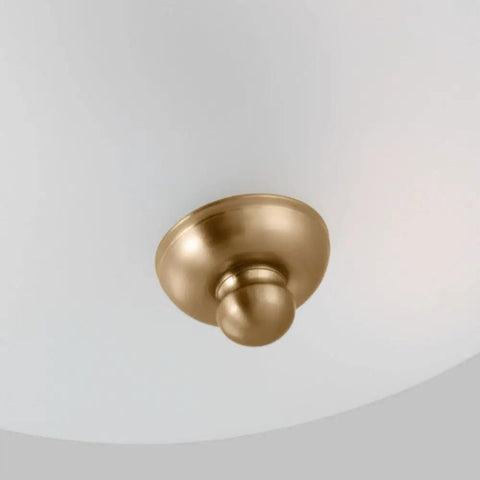 Close-up of Satin Brass 3 Light Flush Mount Ceiling Light In Geary Style, showing brass mount and etched glass.