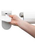 Hand using Touchless Toilet Paper Foam Dispenser Kit Turns Regular Toilet Paper Into Flushable Wipes Wall Mounted Convenience