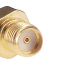 Close-up of gold-plated connector from 3 Pack SMA Male to SMA Female FPV Antenna Adapters Pro Grade Gold Plated Connectors for WiFi