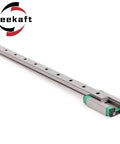 MGN Type Guide Rail Kit For Pro Grade Linear Motion With High Precision And Smooth Friction 100-600mm Adjustable Length For CNC And 3D Printers With One Rail And One Slider MGN15H 100mm, featuring a long metal rail and green slider block.