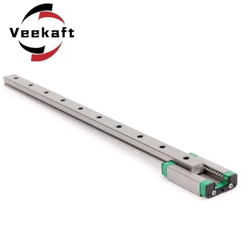 MGN Type Guide Rail Kit For Pro Grade Linear Motion With High Precision And Smooth Friction 100-600mm Adjustable Length For CNC And 3D Printers With One Rail And One Slider MGN15H 100mm, featuring a long metal rail and green slider block.
