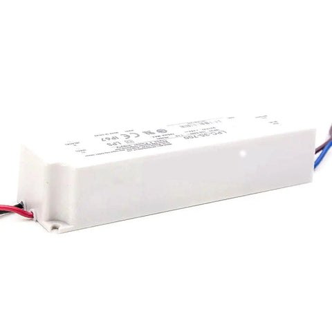 Rugged IP67 Waterproof LED Driver With 700 mA Constant Current For Outdoor Industrial Signage And Architectural Lighting Fully Sealed Enclosure Built To Weather Rain Dust And High Pressure Washdowns, 148x40x30 mm white sealed unit