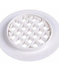 Quick Snap Shower Strainer 4.25 Inch White Plastic Drain Cover And Hair Catcher Filter For Residential Bathroom Tub Fixtures No Sweat Install Game Changer seen from the top with grid pattern.