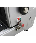 Close-up of CoilMac-ER Plus Manual Coil Punch With Electric Inserter, showcasing a control knob and part of the machine's metal body.