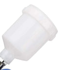 Heavy Duty Gravity Hvlp Paint Sprayer With Precision Flow Valve And Tough Alloy Frame For Sleek Oil Painting Projects showing white gravity cup.
