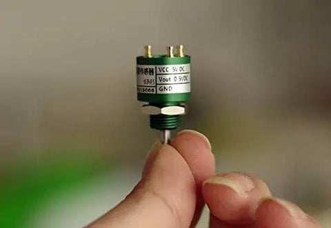 Hand holding Compact Contactless Hall Effect 360 Degree Angle Sensor Encoder With 3mm Shaft And 15mm Outer Diameter
