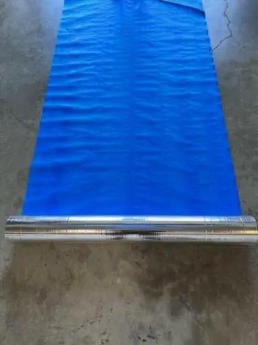 Big Time Heavy Duty Roofing Insulation With Built In Vapor Barrier For Decks Crawlspace Flat Roofs 1000 Square Feet roll on a concrete floor.