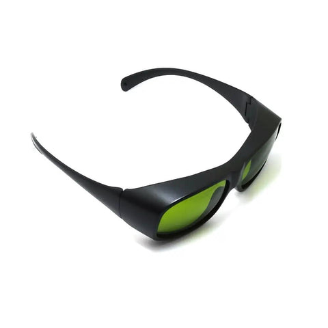 Top Shelf Tough Infrared Laser Safety Glasses Featuring Heavy Duty OD Five Plus And OD Seven Plus Shielding For ND YAG And Diode Lasers Spanning 720 To 1100 Nm Wavelengths Crisp Clear Vision, black frame with green lenses.